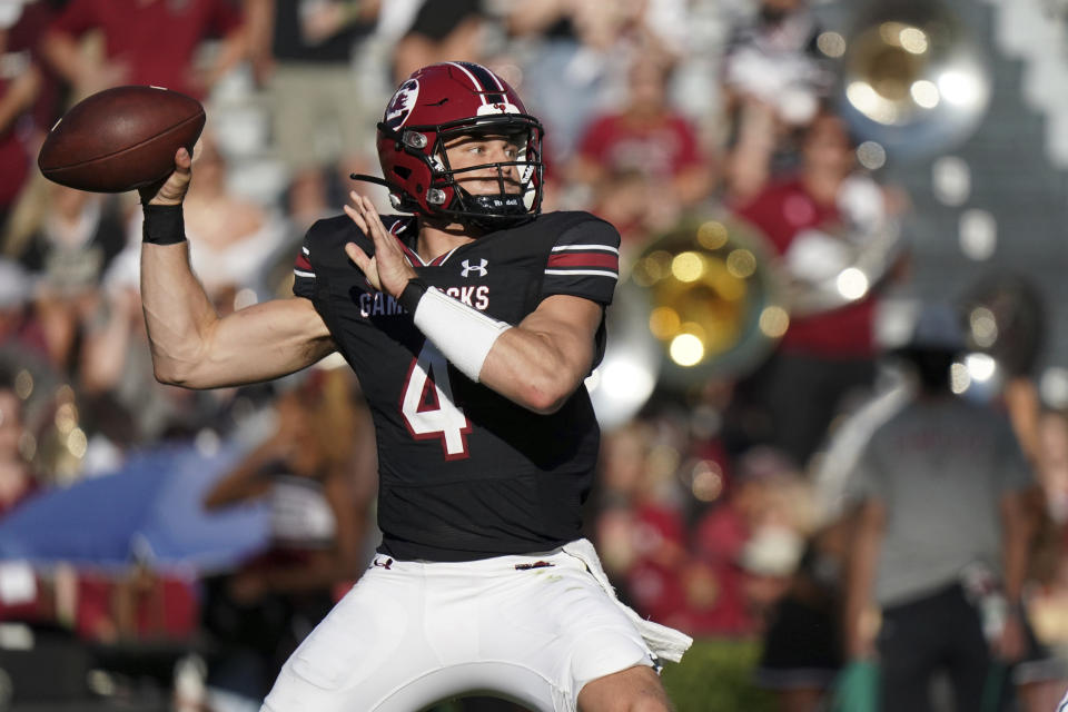 South Carolina quarterback Luke Doty (4) throws a pass during the first half of an NCAA college football game against Vanderbilt, Saturday, Oct. 16, 2021, in Columbia, S.C. (AP Photo/Sean Rayford)