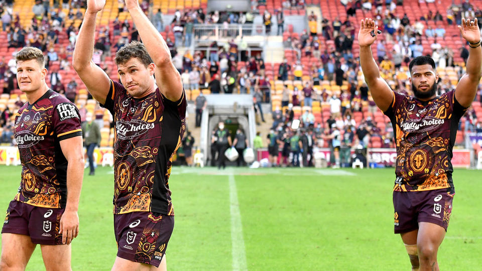 Brisbane Broncos players, pictured here celebrating their victory over Cronulla at Suncorp Stadium.