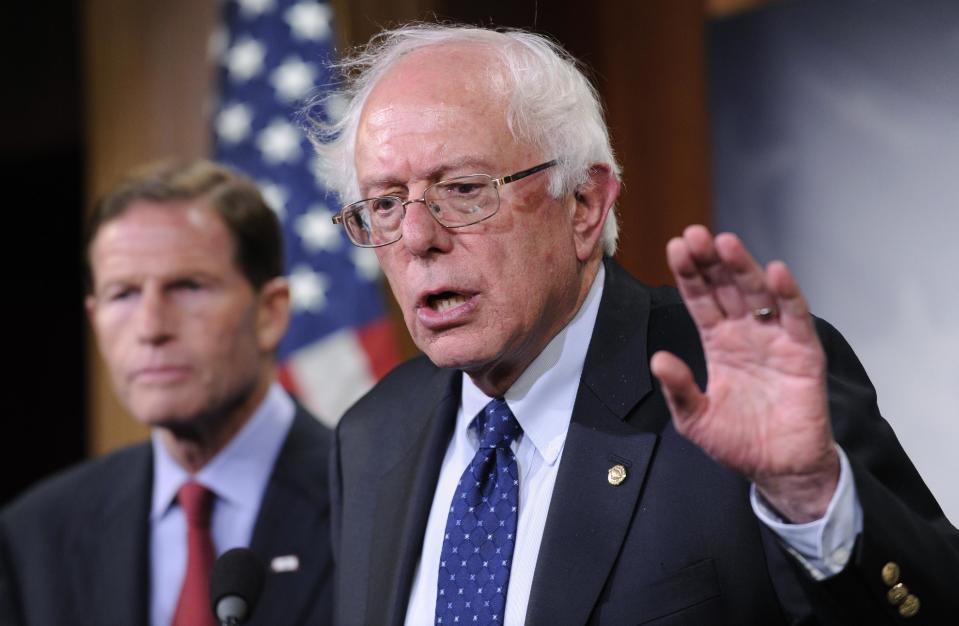 FILE - In this July 24, 2014, file photo, Sen. Bernie Sanders, I-Vt., right, with Sen. Richard Blumenthal, D-Conn., speaks during a news conference on Capitol Hill in Washington. The chairmen of the House and Senate Veterans Affairs committees have reached a tentative agreement on a plan to fix a veterans' health program scandalized by long patient wait times and falsified records covering up delays. Miller and Sen. Bernie Sanders, I-Vt., scheduled a news conference Monday, July 28, to talk about a compromise plan to improve veterans' care. (AP Photo/File)