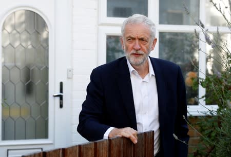 Britain's opposition Labour Party leader Jeremy Corbyn leaves his home in London