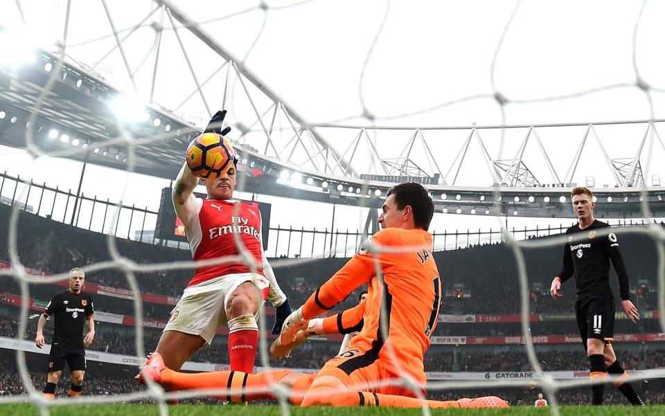 Arsenal 2 Hull City 0: Arsene Wenger tight-lipped about future as Alexis Sanchez gets Gunners back to winning ways