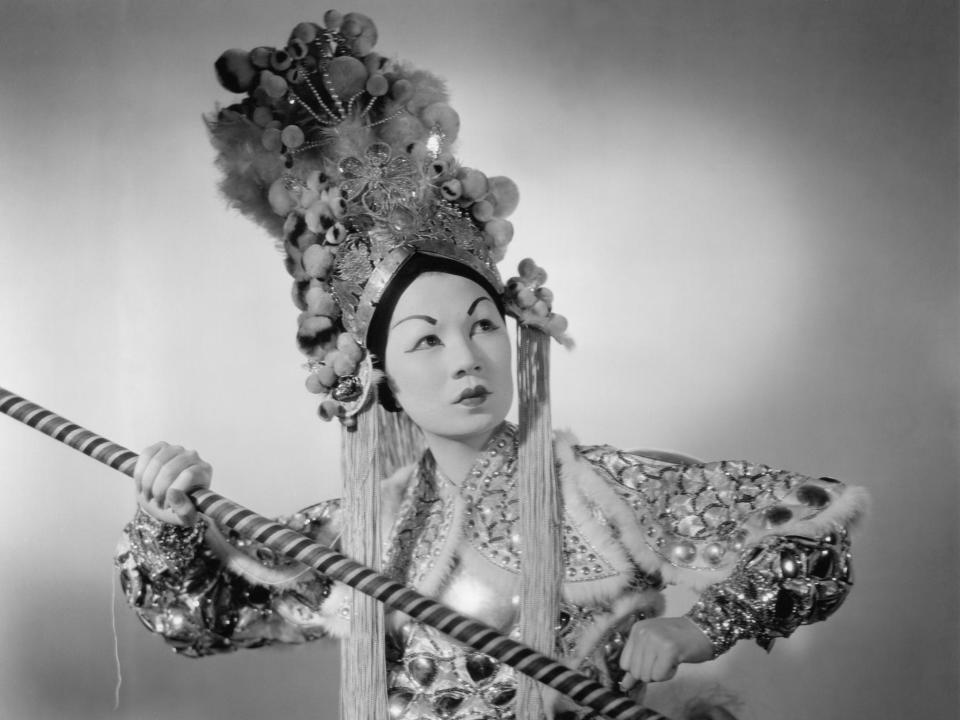 Bessie Loo dressed as Yuan's Wife in a publicity shot for "The Rainbow Pass" in 1937.