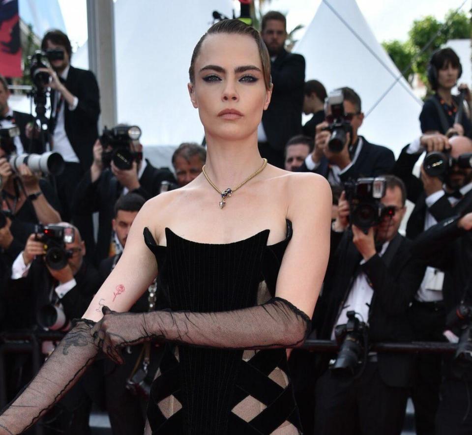 Cara Delevingne and Olivier Rousteing at the 75th Anniversary celebration screening of "The Innocent (L'Innocent)" during the 75th annual Cannes film festival at Palais des Festivals on May 24, 2022 in Cannes.