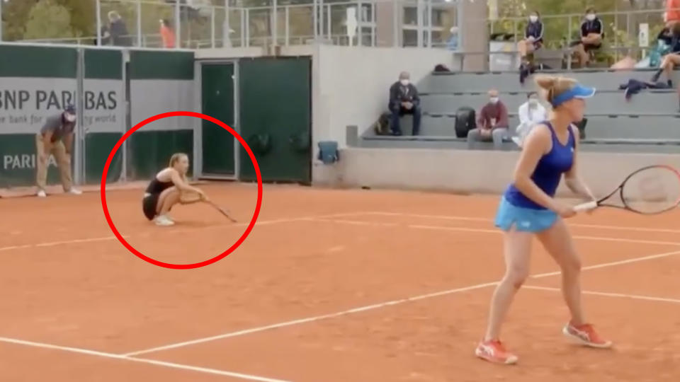 Yana Sizikova is pictured stumbling during the service game that attracted the attention of French prosecutors.