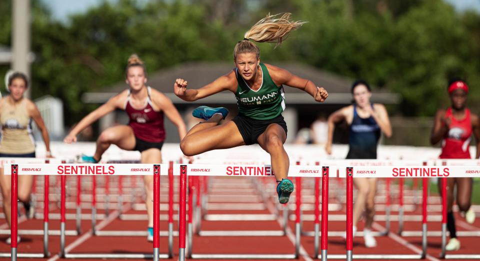 St. John NeumannÕs  Leah Martin-Gonzales wins the 100 hurdles at  the Private 8 meet at ECS on Friday, April 8, 2022. 