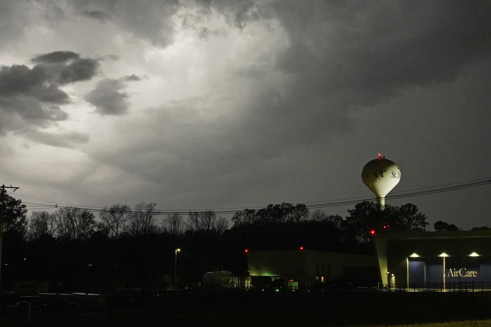 Lightning brightens the evening sky in Jackson, Miss., Tuesday, Nov. 29, 2022. Area residents were provided a light show as severe weather accompanied by some potential twisters affected parts of Louisiana and Mississippi. (AP Photo/Rogelio V. Solis)