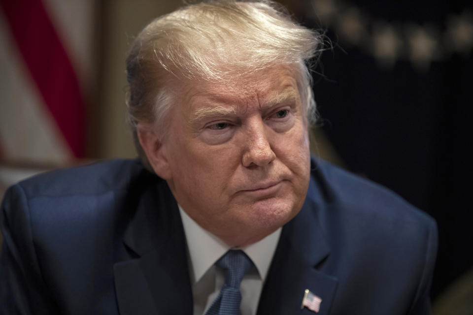 President Donald Trump listens during a roundtable with governors on government regulations in the Cabinet Room of the White House, Monday, Dec. 16, 2019, in Washington. (AP Photo/ Evan Vucci)