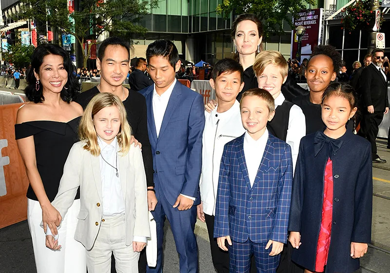 Angelina Jolie and her six kids attended the premiere of the movie at the TIFF with friends. (Photo: George Pimentel/WireImage)