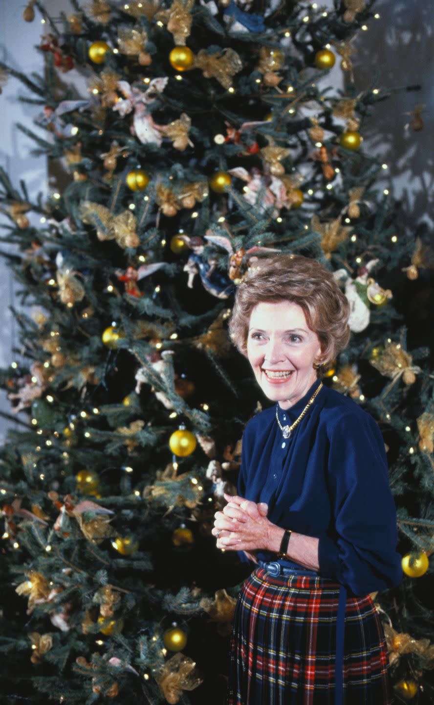 <p>First Lady Nancy Reagan chose to pair white lights with gold and angel ornaments for her second Christmas in the White House. </p>