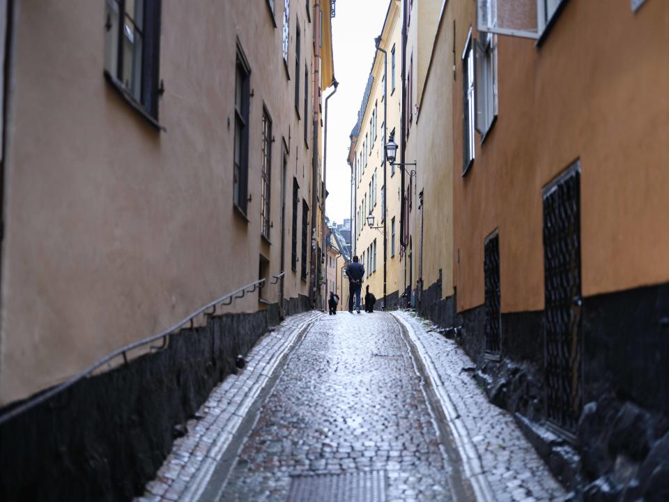 Man walking through the streets of Stockholm