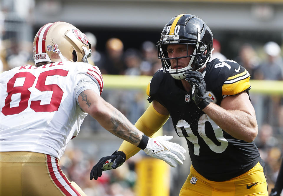 Sep 10, 2023; Pittsburgh, Pennsylvania, USA; Pittsburgh Steelers linebacker T.J. Watt (90) pass rushes at the line of scrimmage against San Francisco 49ers tight end George Kittle (85) during the fourth quarter at Acrisure Stadium. San Francisco won 30-7. Mandatory Credit: Charles LeClaire-USA TODAY Sports