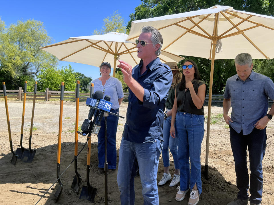 California Gov. Gavin Newsom talks during a ground breaking ceremony at the Dos Rios property, in Modesto, Calif. on Monday April 22, 2024. The property is located in the state's crop-rich Central Valley region, where the state will open its first new state park in a decade this summer. The announcement comes as the state sets targets for cutting planet-warming emissions on natural lands. (AP Photo/Sophie Austin)