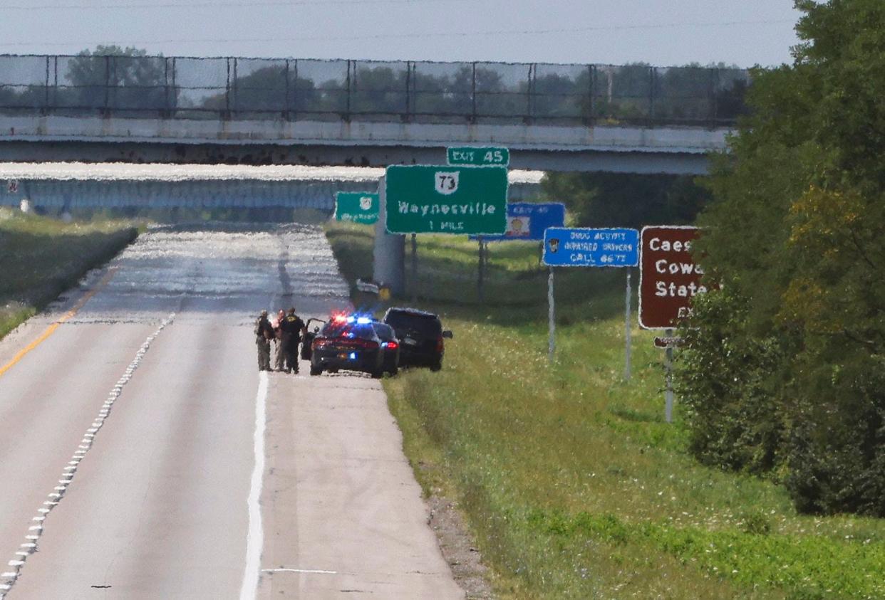 Interstate 71 in Clinton County near Cincinnati, Ohio, sits closed during a standoff Thursday, Aug. 11, 2022, with a man who tried to breach security at the FBI Cincinnati Field Office.