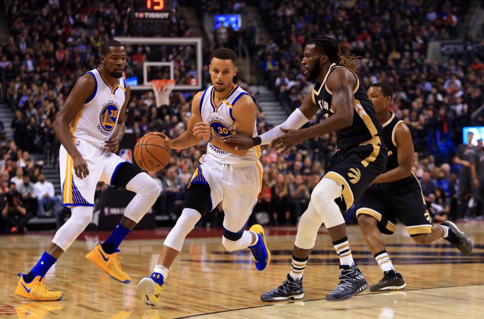 Steph Curry is an obvious choice to lead the elite tier of point guards in the 2018 Fantasy Basketball season. (Photo by Vaughn Ridley/Getty Images)