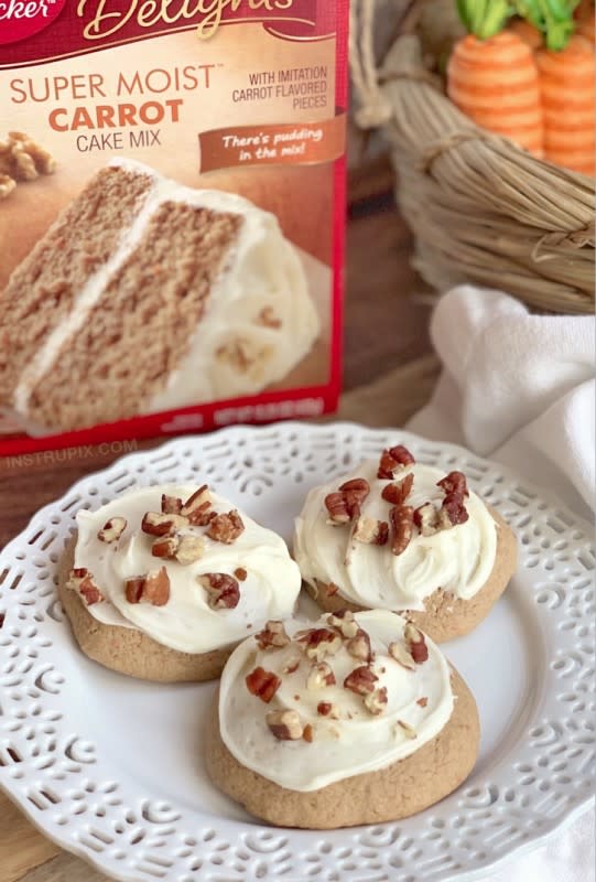 <p>InstruPix</p><p>Summon the Easter bunny to your house with these soft lofthouse carrot cake cookies. You'll love how easy they are to whip up and everyone in your house will thank you for baking them.</p><p><strong>Get the recipe: <a href="https://www.instrupix.com/easy-carrot-cake-mix-cookies-cream-cheese-frosting/" rel="nofollow noopener" target="_blank" data-ylk="slk:Easy Carrot Cake Cookies;elm:context_link;itc:0;sec:content-canvas" class="link rapid-noclick-resp">Easy Carrot Cake Cookies</a></strong></p>