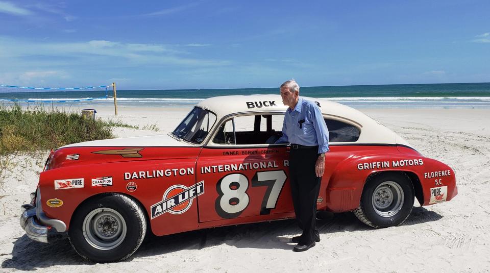 Paul Goldsmith returned to Daytona Beach a few years ago. He's shown here with an Oldsmobile he and others (including Lee Petty and Buck Baker) raced on the beach-and-road course.