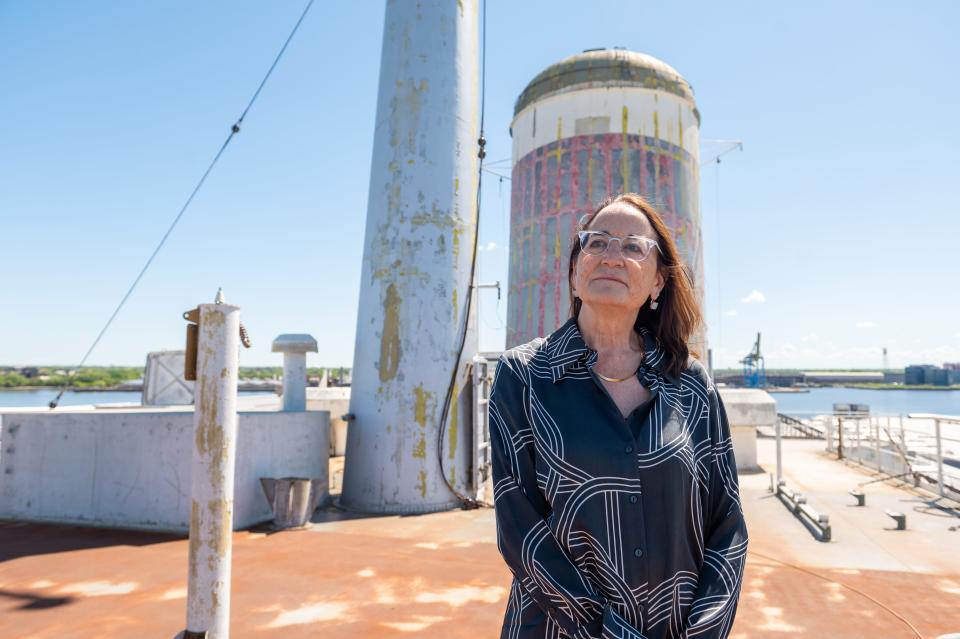 Susan Gibbs, president of the SS United States Conservancy, poses for a picture on the deck of the ship docked in South Philadelphia on Saturday, May 6, 2023.