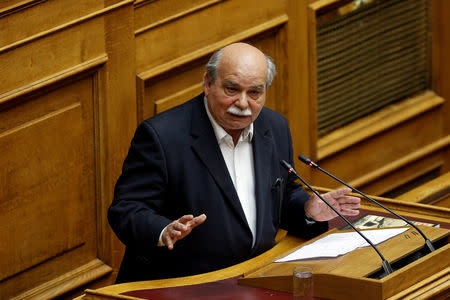 Greek Parliament Speaker Nikos Voutsis addresses lawmakers during a parliamentary session before a vote on German World War II reparations in Athens, Greece April 17, 2019. REUTERS/Costas Baltas