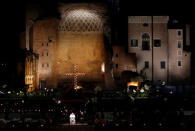 Pope Francis leads the Via Crucis (Way of the Cross) procession during Good Friday celebrations at Rome's Colosseum, Rome, Italy April 19, 2019. REUTERS/Remo Casilli