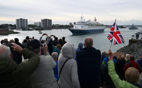 MV Boudicca leaves the harbour to great cheers - Credit: &nbsp;REUTERS/Hannah McKay