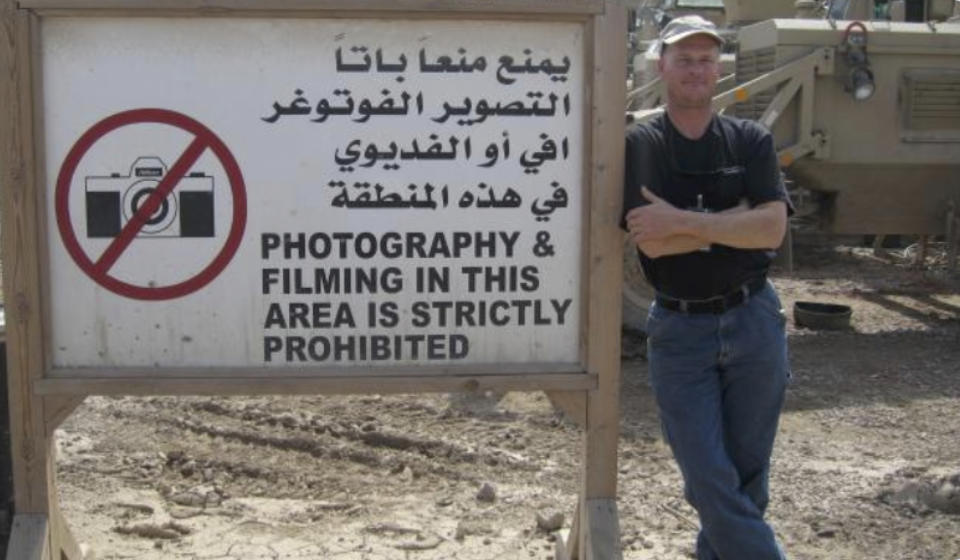 Mark Frerichs, a contractor from Illinois, poses in Iraq in this undated photo obtained from Twitter that he would include with his resume when job hunting. Frerichs was abducted in Afghanistan in January 2020. Early efforts to locate him have been shrouded in mystery and his disappearance has been the subject of minimal public discussion by the U.S. government. The Associated Press has learned that in the days following Frerichs’ capture, Navy commandos raided a village and detained suspected members of the Taliban-linked Haqqani network while the U.S. intelligence community tried to track the cellphones of Frerich and his captors. (Twitter via AP)