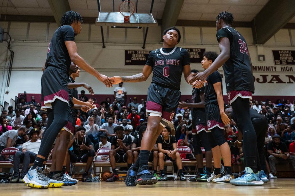 Lake Worth guard Calvin Sirmans (0) takes the court prior to the start of the game between Dwyer and host Lake Worth on Tuesday, January 31, 2023, in Lake Worth Beach, FL. Final score, Lake Worth, 62, Dwyer, 57.