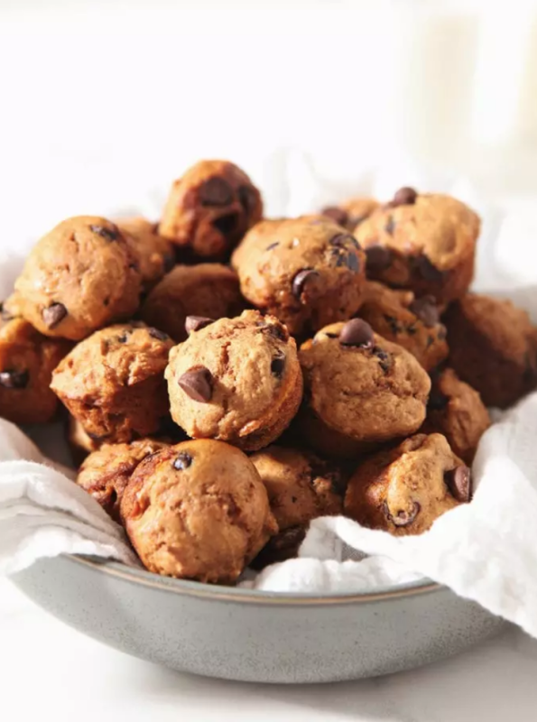 <p>The Speckled Palatte</p><p>These fluffy, bite-sized pumpkin chocolate chip muffins make the best fall breakfast. They're easy to make and share, and they freeze well, too! </p><p><strong>Get the recipe: <em><a href="https://www.thespeckledpalate.com/mini-pumpkin-chip-muffins/" rel="nofollow noopener" target="_blank" data-ylk="slk:Mini Pumpkin Muffins with Chocolate Chips;elm:context_link;itc:0;sec:content-canvas" class="link ">Mini Pumpkin Muffins with Chocolate Chips</a></em></strong></p>