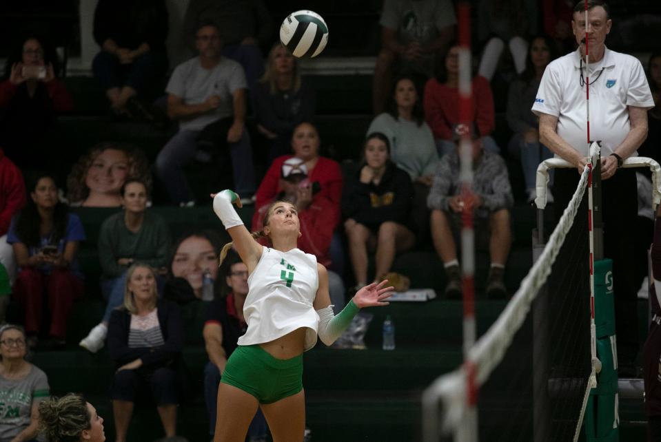 Gabby Dwyer of Fort Myers goes up for a kill against Riverdale in the Class 6A-District 12 Volleyball Championship on Thursday, Oct. 20, 2022, in Fort Myers.