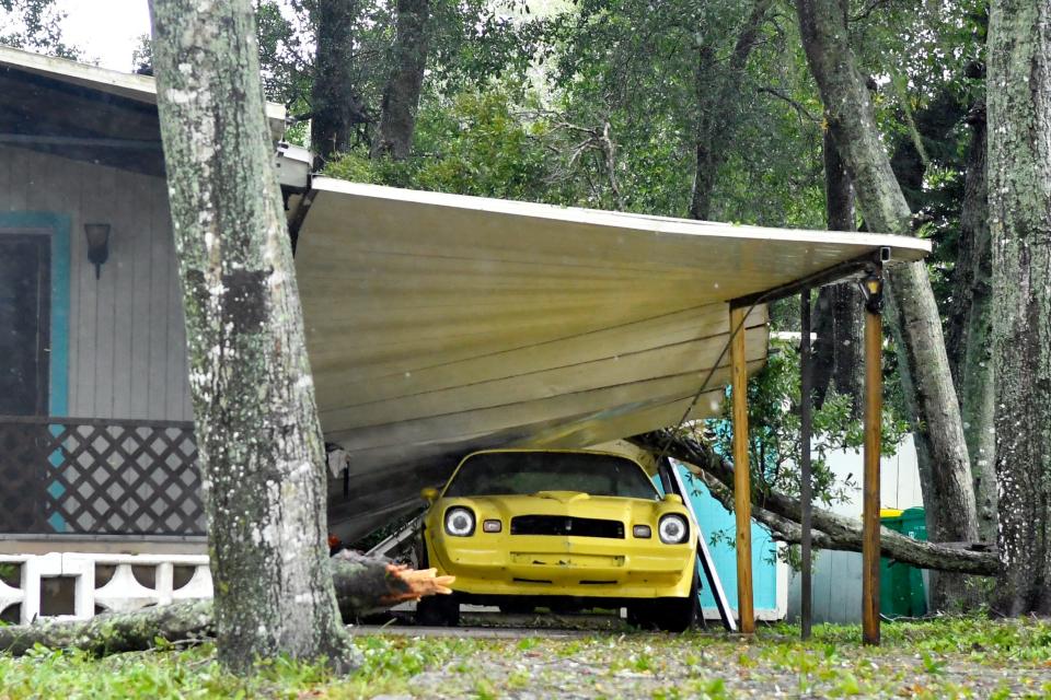 A carport at a home on Vanguard Circle north of Cocoa was damaged as a result of Hurricane Ian.