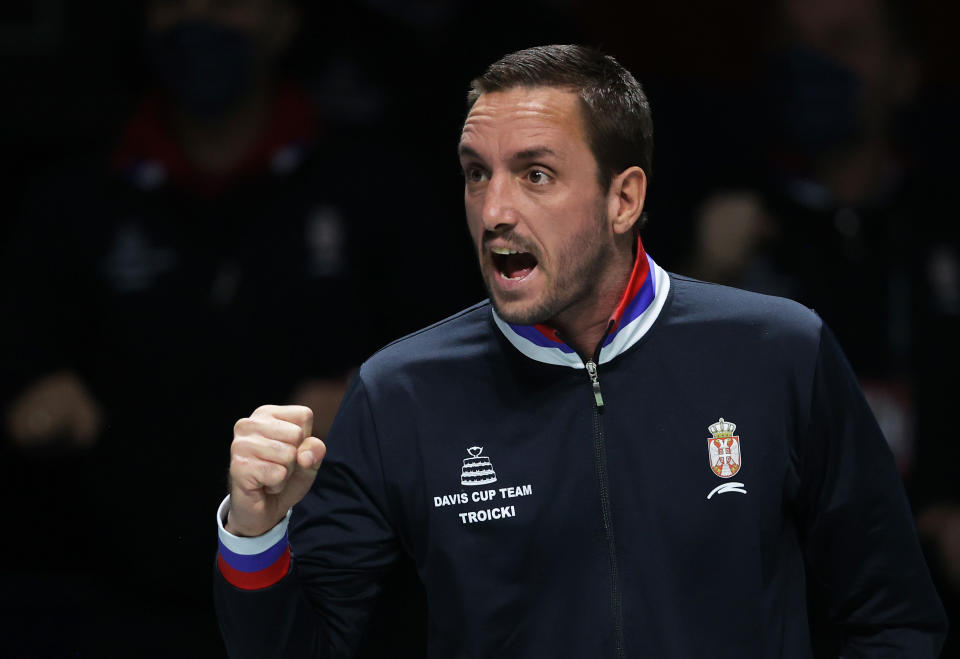 Viktor Troicki celebrates.