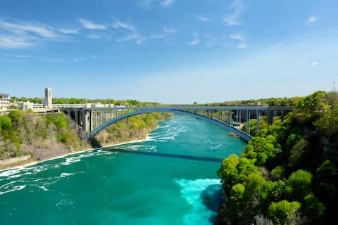 See a great waterfall and visit two countries at Rainbow Bridge - Credit: GETTY