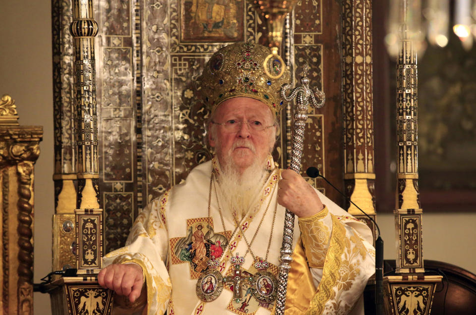 FILE - In this early Sunday, April 16, 2017 file photo, Ecumenical Patriarch Bartholomew I, the spiritual leader of the world's Orthodox Christians, leads the Easter Resurrection Service at the Patriarchal Cathedral of St. George in Istanbul, Turkey. The Russian hackers indicted by the U.S. special prosecutor in July 2018 have spent years trying to steal the private correspondence of some of the world’s most senior Christian Orthodox figures, including top aides to Bartholomew, The Associated Press has found, illustrating the high stakes as Kiev and Moscow wrestle over the religious future of Ukraine. (AP Photo/Lefteris Pitarakis, File)