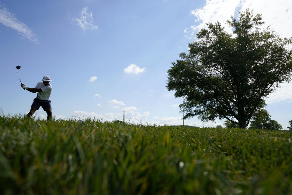 Former NFL football player Victor Cruz tees off on the 10th hole during the ProAm at the BMW Championship golf tournament at Wilmington Country Club, Wednesday, Aug. 17, 2022, in Wilmington, Del. The BMW Championship tournament begins on Thursday. (AP Photo/Julio Cortez)