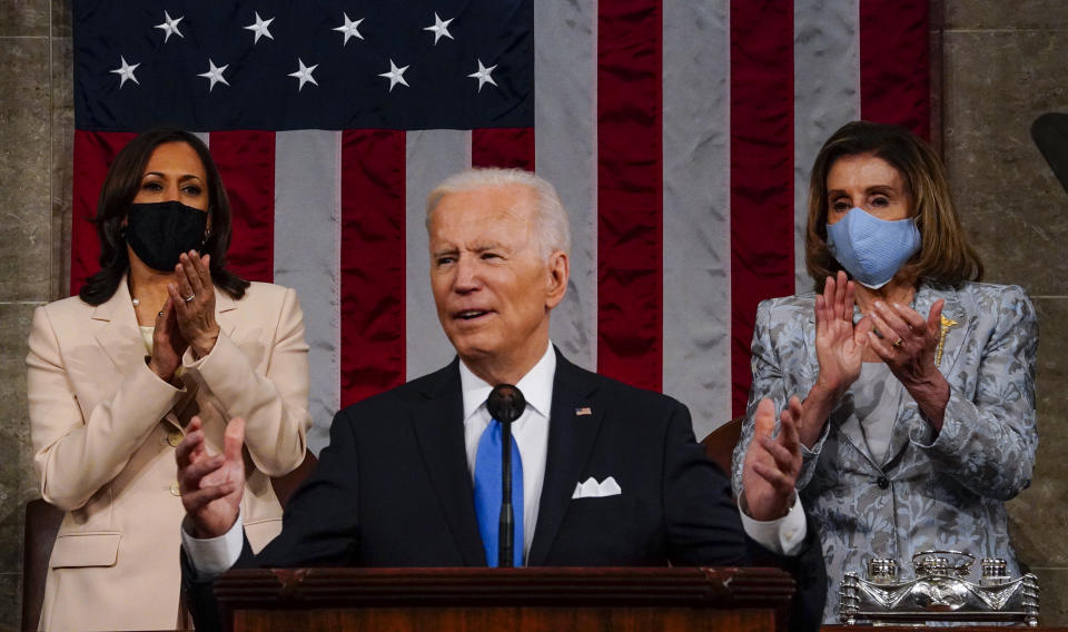 WASHINGTON, DC - APRIL 28: President Joe Biden addresses a joint session of Congress, with Vice President Kamala Harris and House Speaker Nancy Pelosi (D-Calif.) on the dais behind him, on Wednesday, April 28, 2021. Biden spoke to a nation seeking to emerge from twin crises of pandemic and economic slide in his first speech to a joint session of Congress. (Melina Mara/The Washington Post via Getty Images)