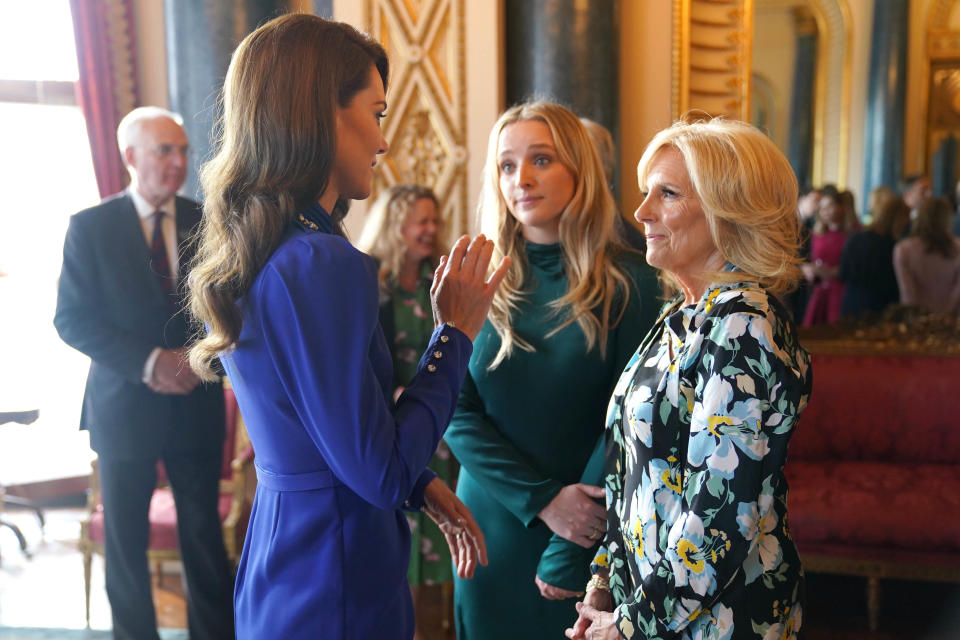Catherine, Princess of Wales speaks with the First Lady of the United States, Dr Jill Biden and her grand daughter Finnegan Biden during a reception at Buckingham Palace for overseas guests attending the coronation of King Charles III on May 5, 2023 in London, England.  (Jacob King / Getty Images)