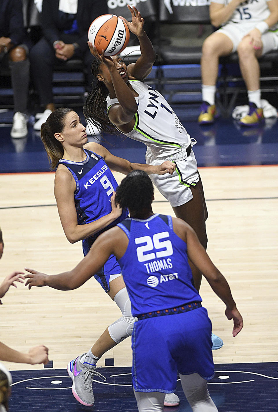 Minnesota Lynx's Diamond Miller (1) puts up a basket against the Connecticut Sun during a WNBA basketball game, Sunday, Sept. 17, 2023, at Mohegan Sun Arena in Uncasville, Conn. (Sarah Gordon/The Day via AP)