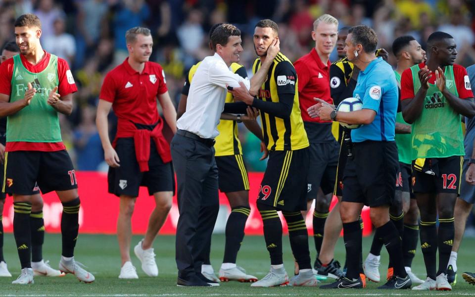 Watford manager Javi Gracia and Etienne Capoue celebrates after the match - Reuters