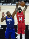 Los Angeles Clippers forward Kawhi Leonard (2) defends against New Orleans Pelicans forward Brandon Ingram (14) during the first quarter of an NBA basketball game Wednesday, Jan. 13, 2021, in Los Angeles. (AP Photo/Ashley Landis)