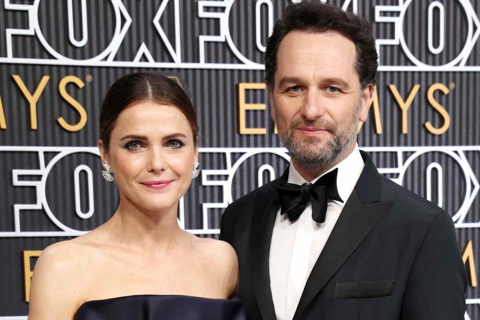 <p>Kevin Mazur/Getty</p> Keri Russell and Matthew Rhys attend the 75th Primetime Emmy Awards