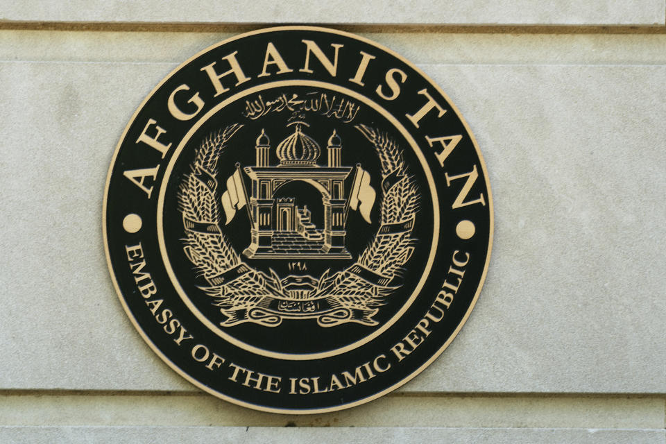 The seal of the embassy of the Islamic Republic of Afghanistan in Washington, Tuesday, May 17, 2022. The United States has taken control of Afghanistan's embassy in Washington and the country's consulates in New York and California. The State Department says it had assumed "sole responsibility" for the security and maintenance of the diplomatic missions effective on Monday and will bar anyone from entering them without its permission. The move came after the department said the embassy and consulates had "formally ceased conducting diplomatic and consular activities in the United States." (AP Photo/Manuel Balce Ceneta)