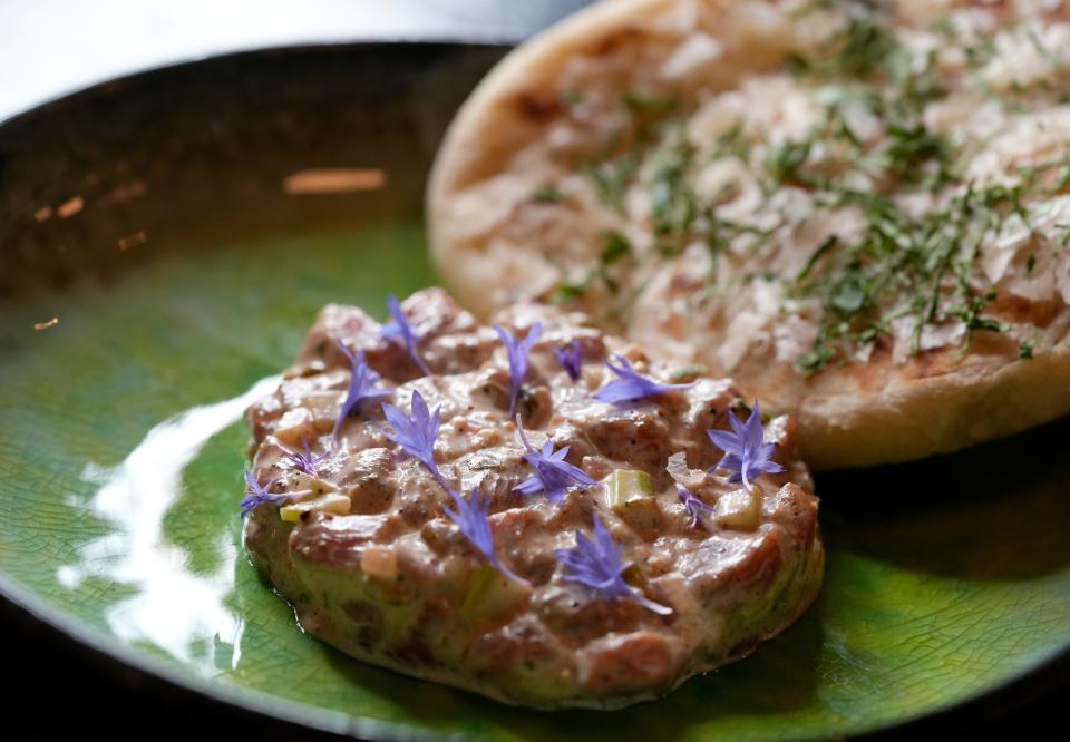 Aug. 1, 2023; Columbus, Oh., USA;  Classic beef tartare and naan bread from Hiraeth.