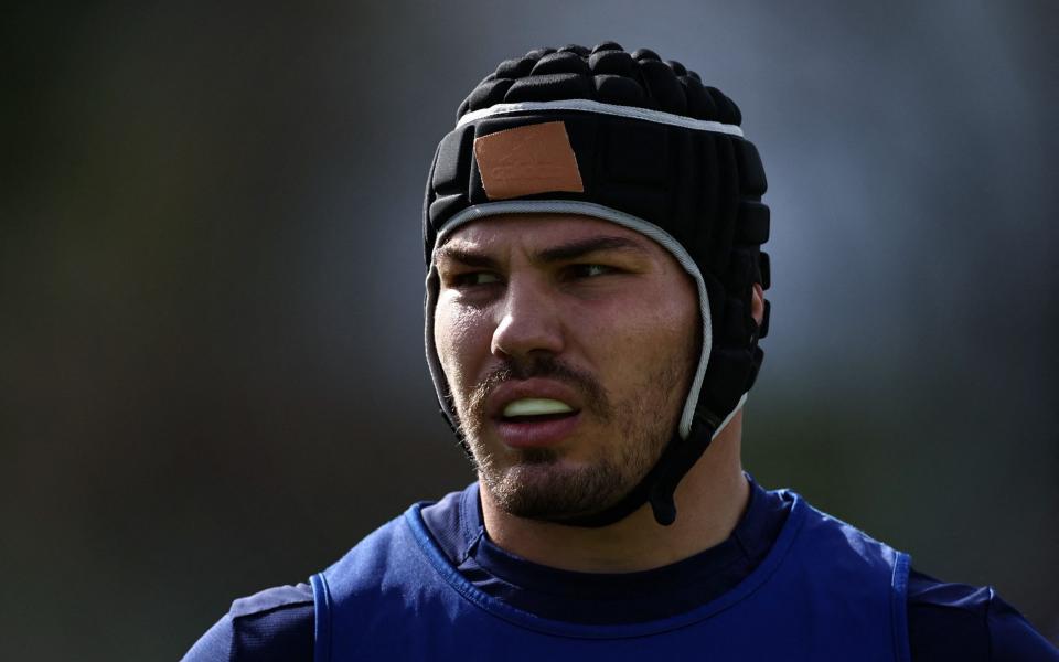 France's scrum-half Antoine Dupont, using a head guard, attends a training session at the Stade du Parc in Rueil-Malmaison, near Paris