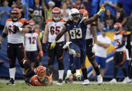 <p>Los Angeles Chargers defensive tackle Darius Philon (93) celebrates after sacking Cincinnati Bengals quarterback Jeff Driskel, bottom left, on a two-point conversion attempt late in the fourth quarter during an NFL football game Sunday, Dec. 9, 2018, in Carson, Calif. (AP Photo/Mark J. Terrill) </p>
