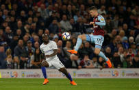 Soccer Football - Premier League - Burnley vs Chelsea - Turf Moor, Burnley, Britain - April 19, 2018 Burnley's Johann Berg Gudmundsson in action with Chelsea's Victor Moses REUTERS/Andrew Yates