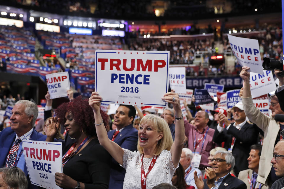 FILE - Delegates cheer as Republican vice presidential candidate Gov. Mike Pence, R-Ind., speaks during the third day session of the Republican National Convention in Cleveland, July 20, 2016. Many state Republican parties made changes to their rules ahead of the 2020 election by adding more winner-take-all contests and requiring candidates to earn higher percentages of the vote to claim any delegates. Those changes all benefit a frontrunner, a position Trump has held despite his mounting legal peril, blame for his party's lackluster performance in the 2022 elections and the turbulent years of his presidency. (AP Photo/Mary Altaffer, File)