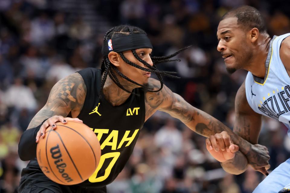 Utah Jazz guard <a class="link " href="https://sports.yahoo.com/nba/players/5357" data-i13n="sec:content-canvas;subsec:anchor_text;elm:context_link" data-ylk="slk:Jordan Clarkson;sec:content-canvas;subsec:anchor_text;elm:context_link;itc:0">Jordan Clarkson</a> (00) drives against Memphis Grizzlies forward Xavier Tillman (2) during the game at the Delta Center in Salt Lake City on Wednesday, Nov. 1, 2023. | Spenser Heaps, Deseret News