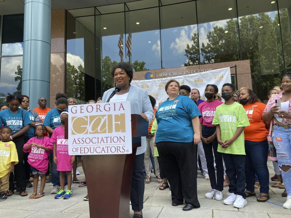 FILE - Georgia Democratic nominee for governor Stacey Abrams unveils a teacher pay raise proposal on Sunday, June 12, 2022, in Tucker, Ga. Abrams was accepting the endorsement of the Georgia Association of Educators. (AP Photo/Jeff Amy, File)