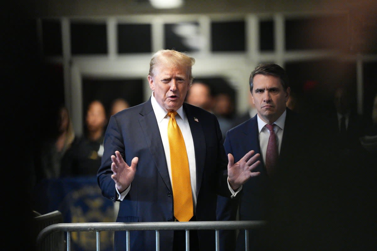 Donald Trumps speaks to reporters in a criminal courthouse in Manhattan on May 29. (Getty Images)