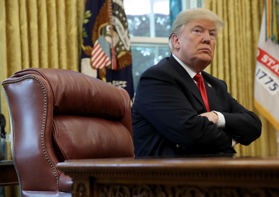 WASHINGTON, DC - OCTOBER 10: U.S. President Donald Trump (L) discusses the potential impact of Hurricane Michael during a meeting with Homeland Security Secretary Kirstjen Nielsen and FEMA Administrator Brock Long in the Oval Office of the White House on October 10, 2018 in Washington, DC. Hurricane Michael has recently been upgraded to a category 4 storm. (Photo by Win McNamee/Getty Images)