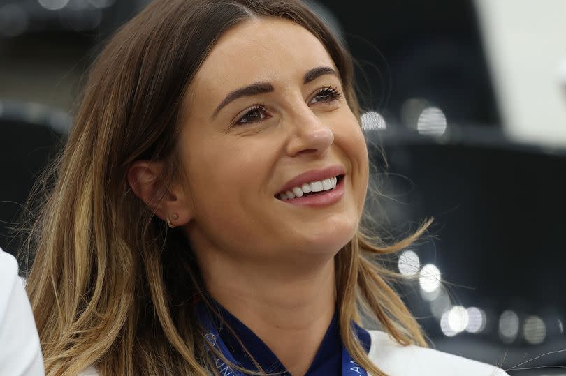 FRANKFURT AM MAIN, GERMANY - JUNE 20: Dani Dyer, Partner of Jarrod Bowen, looks on prior to the UEFA EURO 2024 group stage match between Denmark and England at Frankfurt Arena on June 20, 2024 in Frankfurt am Main, Germany. (Photo by Richard Pelham/Getty Images)